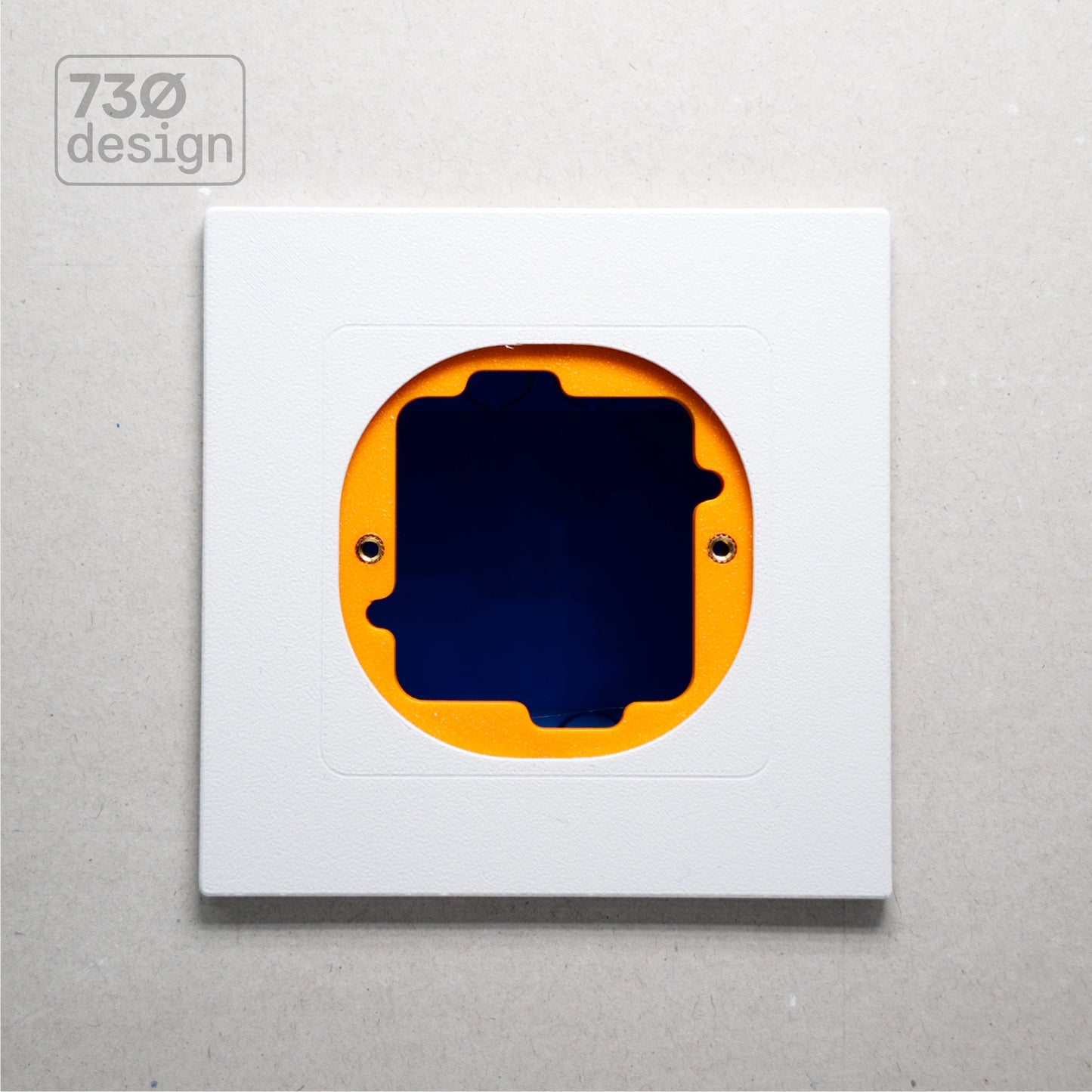 ControlFix NA 2-Gang adapter plate in Arctic White - front view before panel installation, showing orange mounting plate through cutout. Compatible with Dynalite Revolution Display (PDRDE), Revolution Button EU (PDRxE), and Dynalite Antumbra EU panels